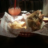 Photo taken at Red Robin Gourmet Burgers and Brews by Juice T. on 6/6/2012