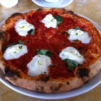 Photo taken at Olio Wood Fired Pizzeria by Laura B. on 5/13/2012