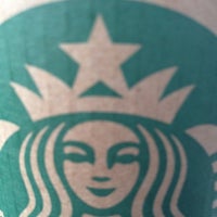 Photo taken at Starbucks by Erik W. on 3/22/2012