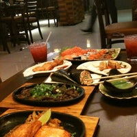 Photo taken at Zensei Sushi by Andrea G. on 3/11/2012