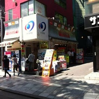 Photo taken at ドコモショップ 原宿店 by Hyoun Don Y. on 8/2/2012