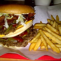 Photo taken at Jaws Jumbo Burgers by Sara E. on 5/20/2012