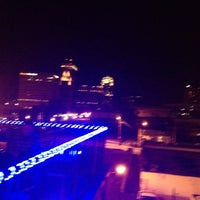 Photo taken at District Roof Top Bar and Grille by Suzanne R. on 4/22/2012