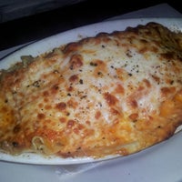 Photo taken at Lasagna Restaurant by Simon W. on 8/5/2012