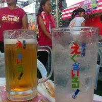 Photo taken at 居酒屋えぐざいる by Shinya K. on 8/24/2012