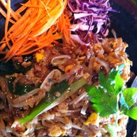 Photo taken at Wild Thai Restaurant by Naomi T. on 5/7/2012