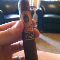 Photo taken at Crossroads Cigars by Nick C. on 6/10/2012