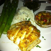 Photo taken at Bonefish Grill by Ray J. on 7/26/2012