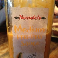 Photo taken at Nando&amp;#39;s by A on 6/28/2012