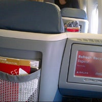 Photo taken at Delta Flight DL19 by Russell F. on 4/14/2012