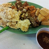 Photo taken at Kopitiam by Esther S. on 4/23/2012