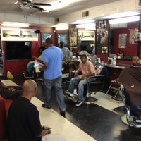 Photo taken at Q&amp;#39;s Barbershop by Jay B. on 7/13/2012