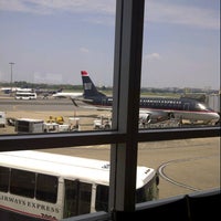 Photo taken at Gate D35 by Brian R. on 7/17/2012