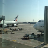 Photo taken at Gate E34 by Tomy M. on 5/29/2012
