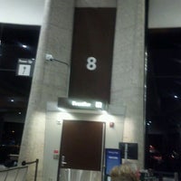 Photo taken at Gate A8 by Anne M. on 3/1/2012