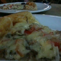 Photo taken at Pizza House by lex o. on 5/1/2012