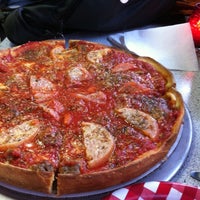 Photo taken at South of Chicago Pizza and Beef by Morgan B. on 3/30/2012