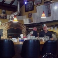 Photo taken at Sals Pizzeria by Brittany H. on 7/13/2012
