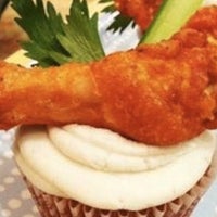 Photo taken at Cups N Cakes by Thrillist on 5/16/2012