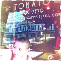 Photo taken at The Tomato Cafe by Andrea M. on 7/1/2012