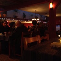 Photo taken at Millos Restaurant by Aaron S. on 3/17/2012