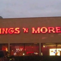 Photo taken at Wings &amp;#39;N More by Leti G. on 2/28/2012