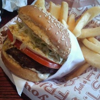 Photo taken at Red Robin Gourmet Burgers and Brews by Ben J. on 6/13/2012