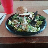 Photo taken at Chicken Out Rotisserie by Brandy C. on 3/3/2012