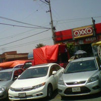 Photo taken at Oxxo C.U. by Carlo M. on 6/11/2012