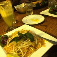 Photo taken at Wild Ginger Pan-Asian Vegan Cafe by Emily L. on 5/29/2012