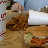 Photo taken at Five Guys by Dessirree F. on 4/3/2012