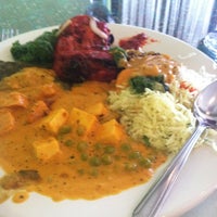 Photo taken at India Palace by Andrea G. on 6/12/2012