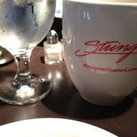 Photo taken at Strings Restaurant by Kyle M. on 5/13/2012