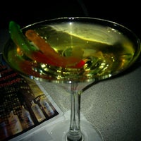 Photo taken at JoJo&amp;#39;s Martini Lounge by Jen S. on 2/25/2012