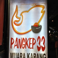 Photo taken at Ikan Bakar Pangkep 33 - Khas Makassar by Ivan C. on 4/10/2012
