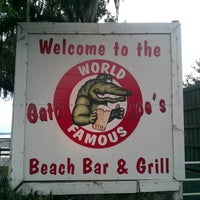 Photo taken at Gator Joe&#39;s Beach Bar &amp; Grill by Kevin M. on 7/10/2012