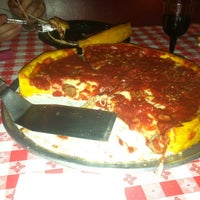Photo taken at Gino&#39;s East by Leland G. on 7/11/2012