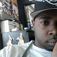 Photo taken at Kutting Edge Barber Shop by Cedric E. on 8/21/2012
