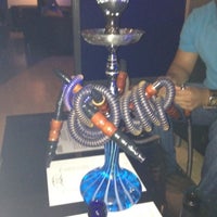 Photo taken at Oasis Liquid (Hookah Lounge) by Adrion S. on 7/22/2012