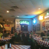 Photo taken at Carmine&amp;#39;s Pizzeria by Bruce T. on 3/18/2012