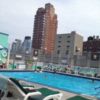 Photo taken at Holiday Inn Rooftop Pool by Eric S. on 7/7/2012