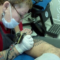 Photo taken at Tattoo Ilha by Raul P. on 7/14/2012