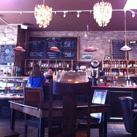 Photo taken at East Village Coffee Lounge by Stephanie G. on 5/21/2012
