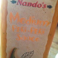Photo taken at Nando&amp;#39;s by Inês E. on 9/2/2012