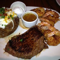 Photo taken at Outback Steakhouse by Erin M. on 4/28/2012