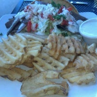 Photo taken at Champps by Angelina T. on 6/15/2012