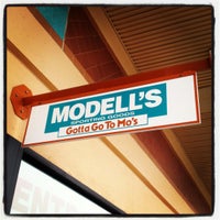 Photo taken at Modell&amp;#39;s Sporting Goods by Phil on 6/21/2012