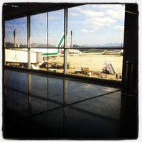 Photo taken at Check-in Alitalia by Renata B. on 8/4/2012