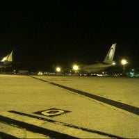 Photo taken at Gate C24 by yasmine y. on 9/8/2012
