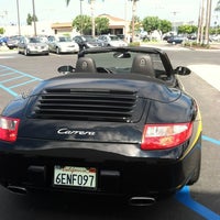 Photo taken at Volkswagen South Coast by Michele on 8/24/2012